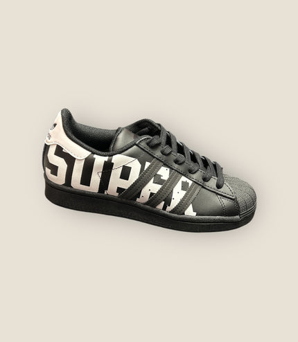 Sneakers adidas superstar Nera scritta Bianca