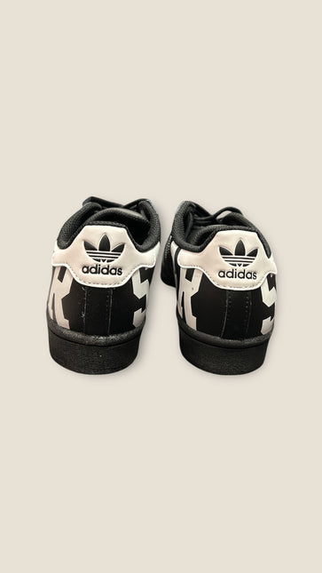 Sneakers adidas superstar Nera scritta Bianca