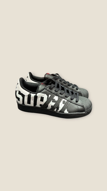 Sneakers adidas superstar Nera scritta Bianca